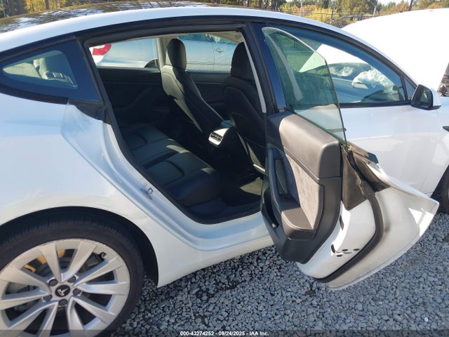5YJ3E1EA2MF918331 Tesla 2021