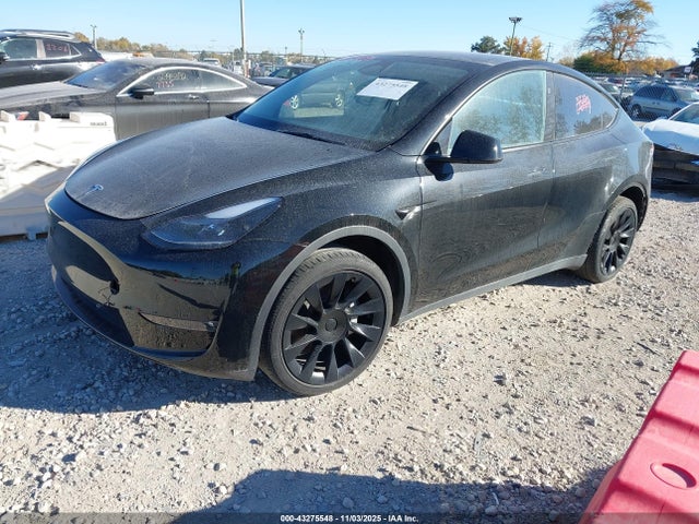 2023 TESLA MODEL Y 7SAYGDEE2PF851838 Photo 1
