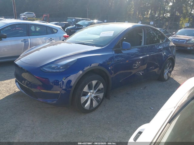 2023 TESLA MODEL Y 7SAYGDEE3PF957974 Photo 1