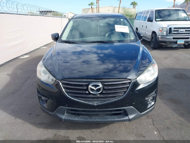 JM3KE4DY7G0826914 Mazda py