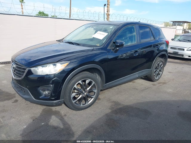 JM3KE4DY7G0826914 Mazda py