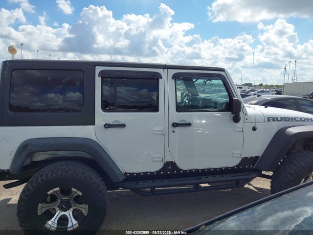 2011 Jeep Wrangler Unlimited Rubicon მანქანა იყიდება აუქციონზე, vin: 1J4BA6H10BL536027, აუქციონის ნომერი: 43282099