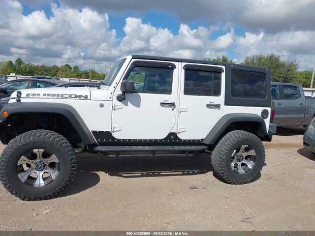 2011 Jeep Wrangler Unlimited Rubicon მანქანა იყიდება აუქციონზე, vin: 1J4BA6H10BL536027, აუქციონის ნომერი: 43282099