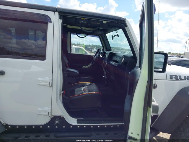 2011 Jeep Wrangler Unlimited Rubicon მანქანა იყიდება აუქციონზე, vin: 1J4BA6H10BL536027, აუქციონის ნომერი: 43282099