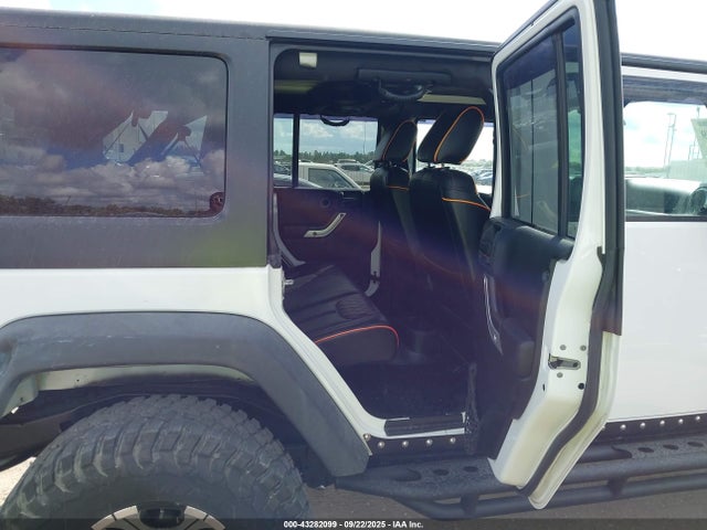 2011 Jeep Wrangler Unlimited Rubicon მანქანა იყიდება აუქციონზე, vin: 1J4BA6H10BL536027, აუქციონის ნომერი: 43282099