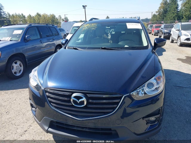 JM3KE4CY1G0836551 Mazda py