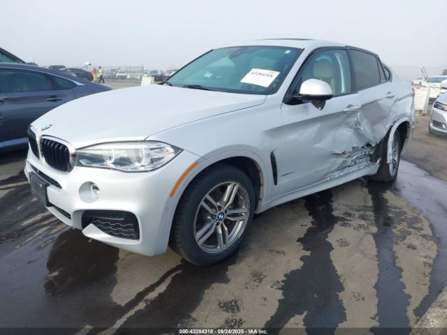 2019 BMW X6 5UXKU2C53K0Z64335 Photo 1