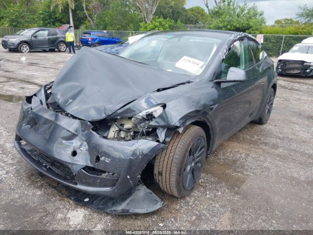 2024 TESLA MODEL Y 7SAYGDEE2RA325578 Photo 1