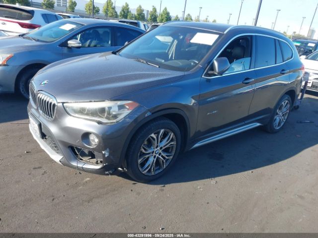 2017 BMW X1 WBXHT3Z32H4A56816 Photo 1