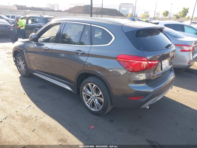 2017 BMW X1 WBXHT3Z32H4A56816 Photo 2
