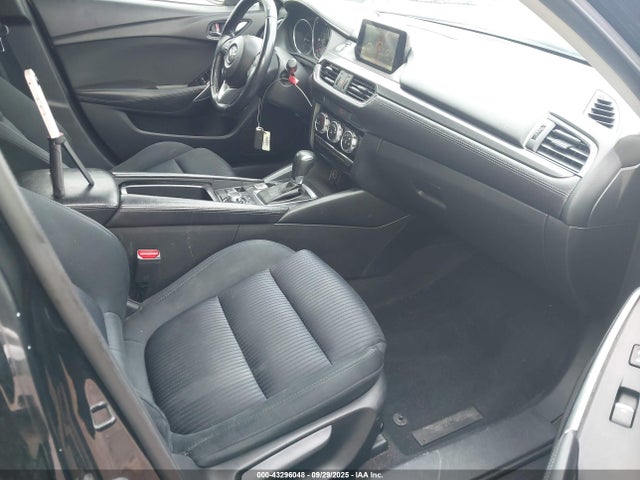 JM1GJ1U51G1457394 Mazda py