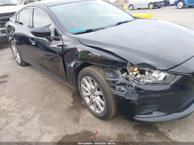 JM1GJ1U51G1457394 Mazda py