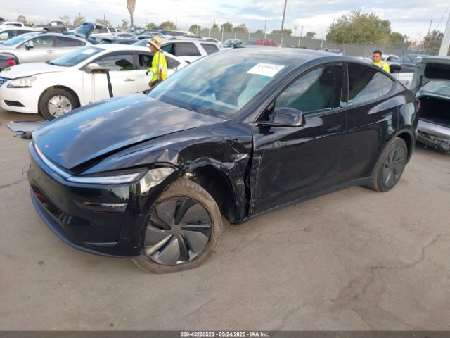 2026 TESLA MODEL Y 7SAYGDED0TF412980 Photo 1