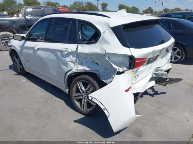 2018 BMW X1 WBXHU7C36J5H43021 Photo 2