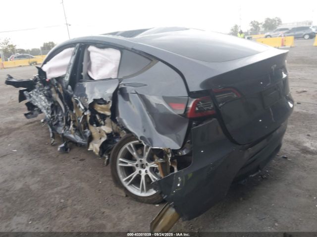 2023 TESLA MODEL Y 7SAYGDEE1PF913844 Photo 2