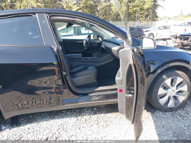 2023 TESLA MODEL Y 7SAYGDEE7PF853133 Photo 4