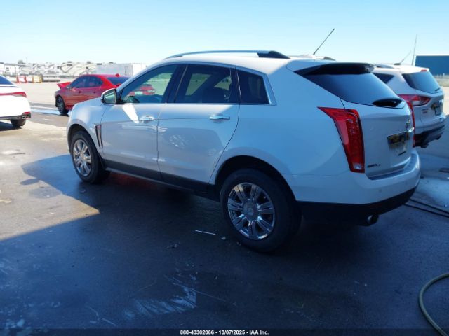 2016 CADILLAC SRX 3GYFNEE31GS535797 Photo 2