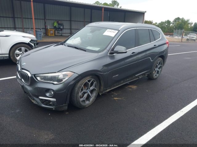 2016 BMW X1 WBXHT3C36G5E49901 Photo 1