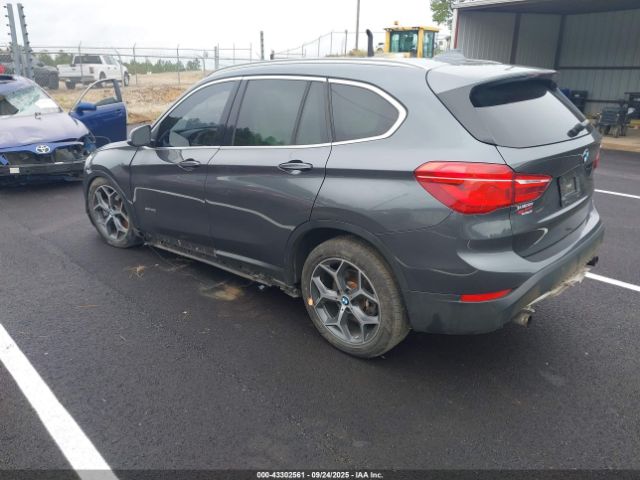 2016 BMW X1 WBXHT3C36G5E49901 Photo 2