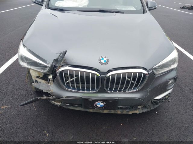 2016 BMW X1 WBXHT3C36G5E49901 Photo 5