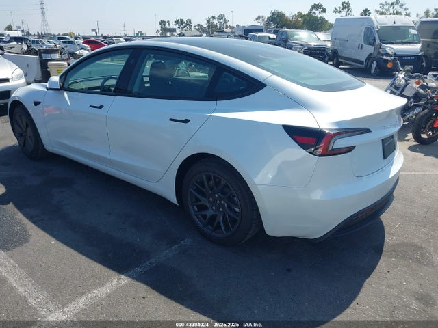 2025 TESLA MODEL 3 5YJ3E1EA7SF024855 Photo 2