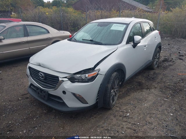 Mazda pe 2017 JM1DKFC75H0173077 Image 2