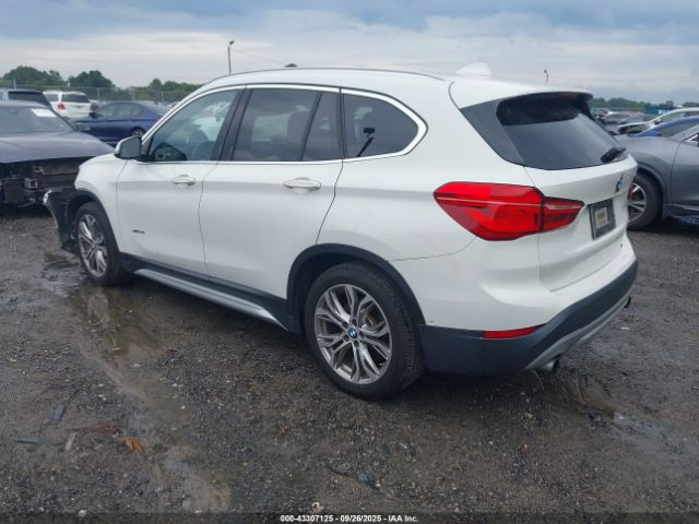 2016 BMW X1 WBXHT3Z37G4A50685 Photo 2