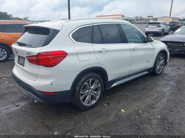 2016 BMW X1 WBXHT3Z37G4A50685 Photo 3