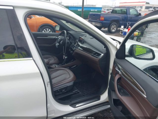 2016 BMW X1 WBXHT3Z37G4A50685 Photo 4