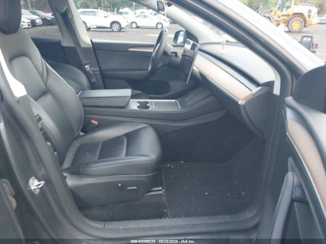 2023 TESLA MODEL Y 7SAYGDEE8PF893611 Photo 4