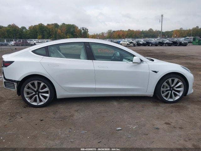 5YJ3E1EB2JF112221 Tesla 2018