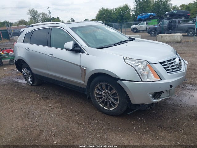 2015 CADILLAC SRX 3GYFNBE32FS592619 Photo 0