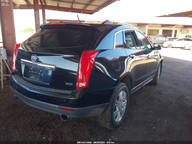 2014 CADILLAC SRX 3GYFNBE3XES664634 Photo 3