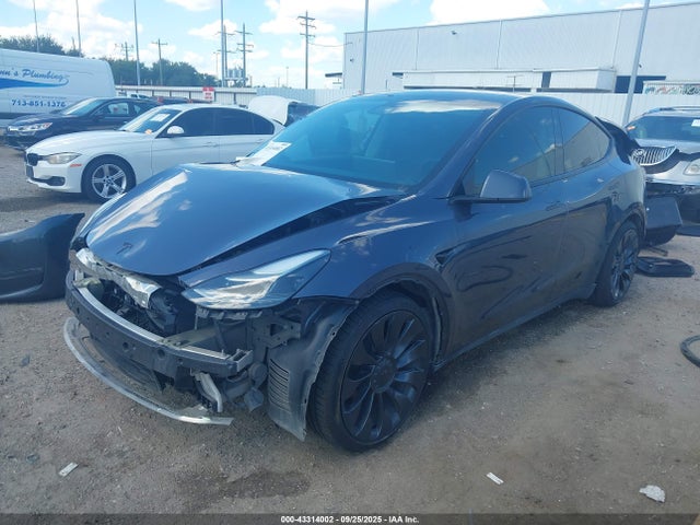 2023 TESLA MODEL Y 7SAYGDEF4PF785348 Photo 1