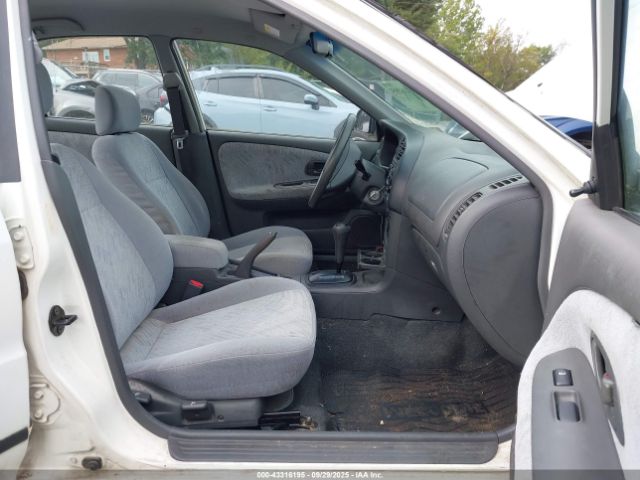 2001 MITSUBISHI MIRAGE JA3AY26C11U038582 Photo 4