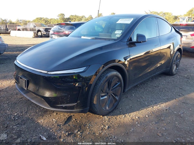 2026 TESLA MODEL Y 7SAYGDEDXTA454991 Photo 1