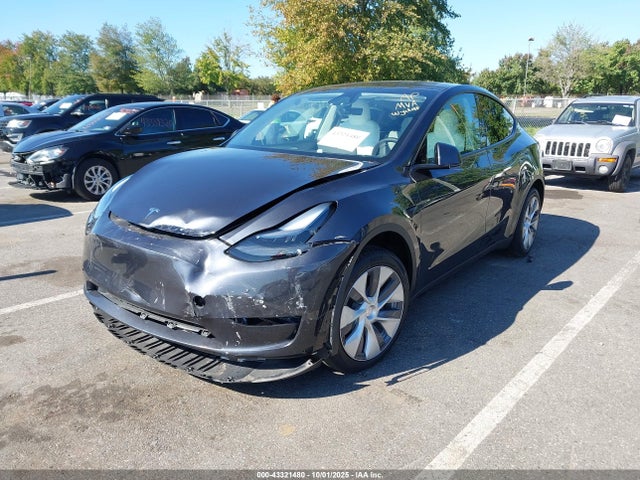 2024 TESLA MODEL Y 7SAYGDEE2RA281310 Photo 1