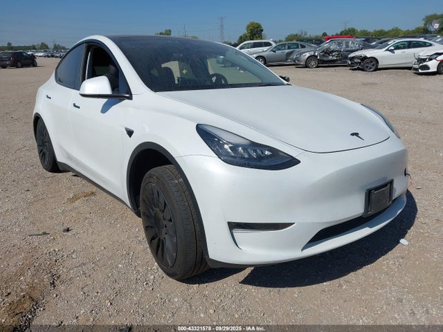 2023 TESLA MODEL Y 7SAYGDEE0PA128650 Photo 0