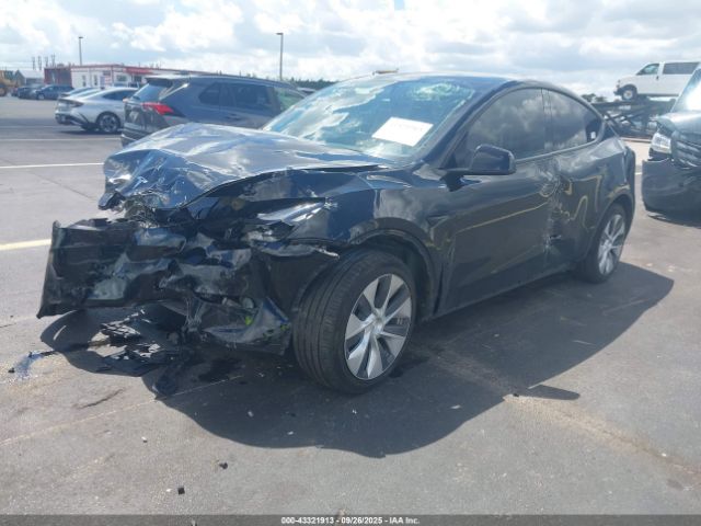 2023 TESLA MODEL Y 7SAYGDEE4PF707773 Photo 1