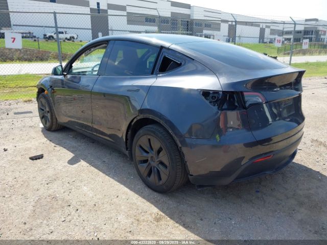 2025 TESLA MODEL Y 7SAYGDED6SA359486 Photo 2