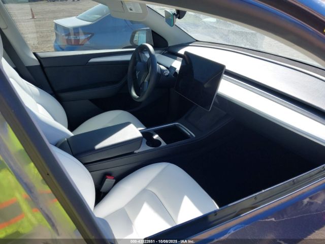 2023 TESLA MODEL Y 7SAYGAEE1PF869892 Photo 4