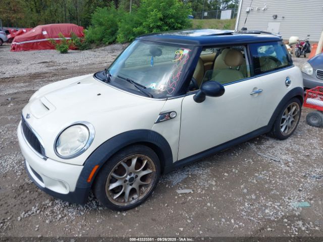 2009 MINI COOPER S WMWMF73559TT99786 Photo 1