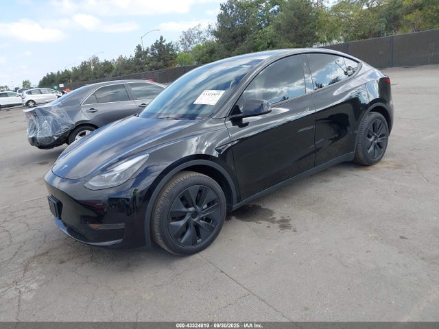 2024 TESLA MODEL Y 7SAYGDED8RF156984 Photo 1