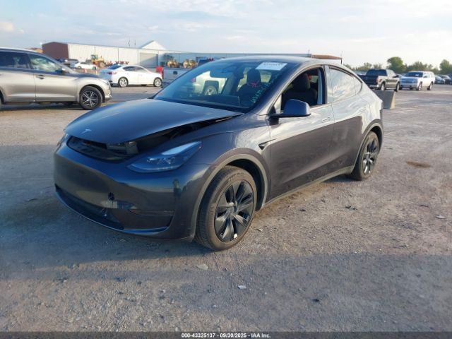 2024 TESLA MODEL Y 7SAYGDED2RF103634 Photo 1