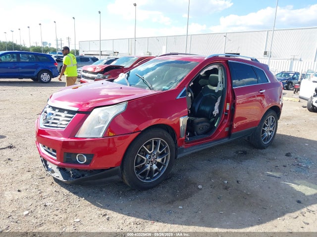 2016 CADILLAC SRX 3GYFNDE33GS570061 Photo 1