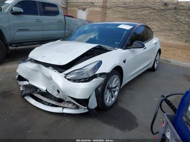 2021 TESLA MODEL 3 5YJ3E1EB4MF997381 Photo 1