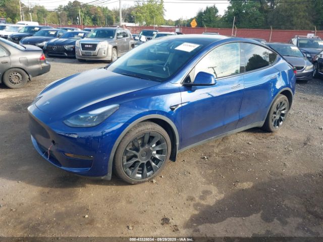 2023 TESLA MODEL Y 7SAYGAEE1PF970785 Photo 1