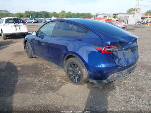 2023 TESLA MODEL Y 7SAYGAEE1PF970785 Photo 2