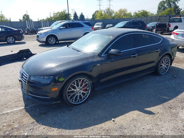 2016 AUDI A7 WAU3GAFC8GN009488 Photo 1