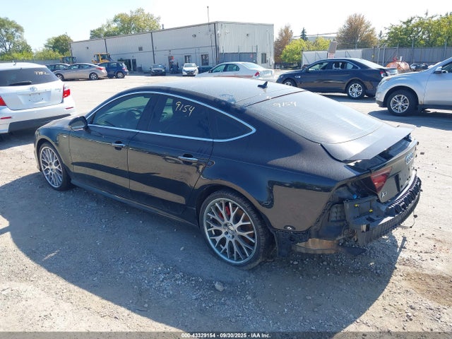 2016 AUDI A7 WAU3GAFC8GN009488 Photo 2